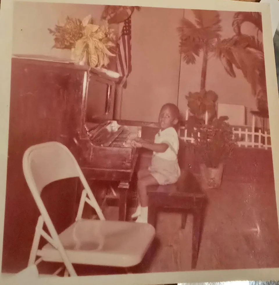 Keith as a young boy at the piano